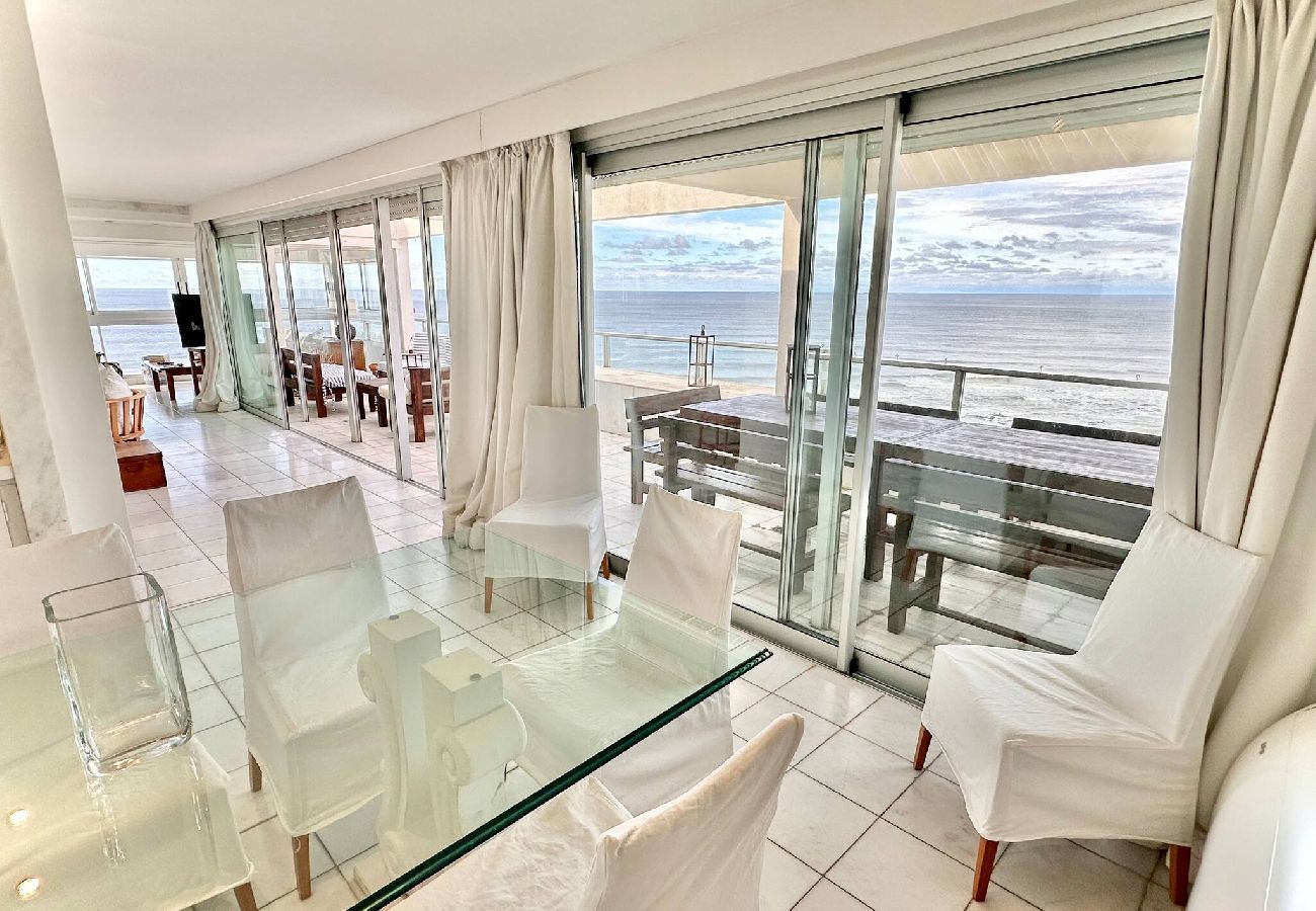 Modern living room with sea view, terrace and barbecue area
